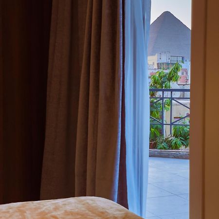 King Khufu Pyramids View Hotel Kafret el-Gabal Zimmer foto