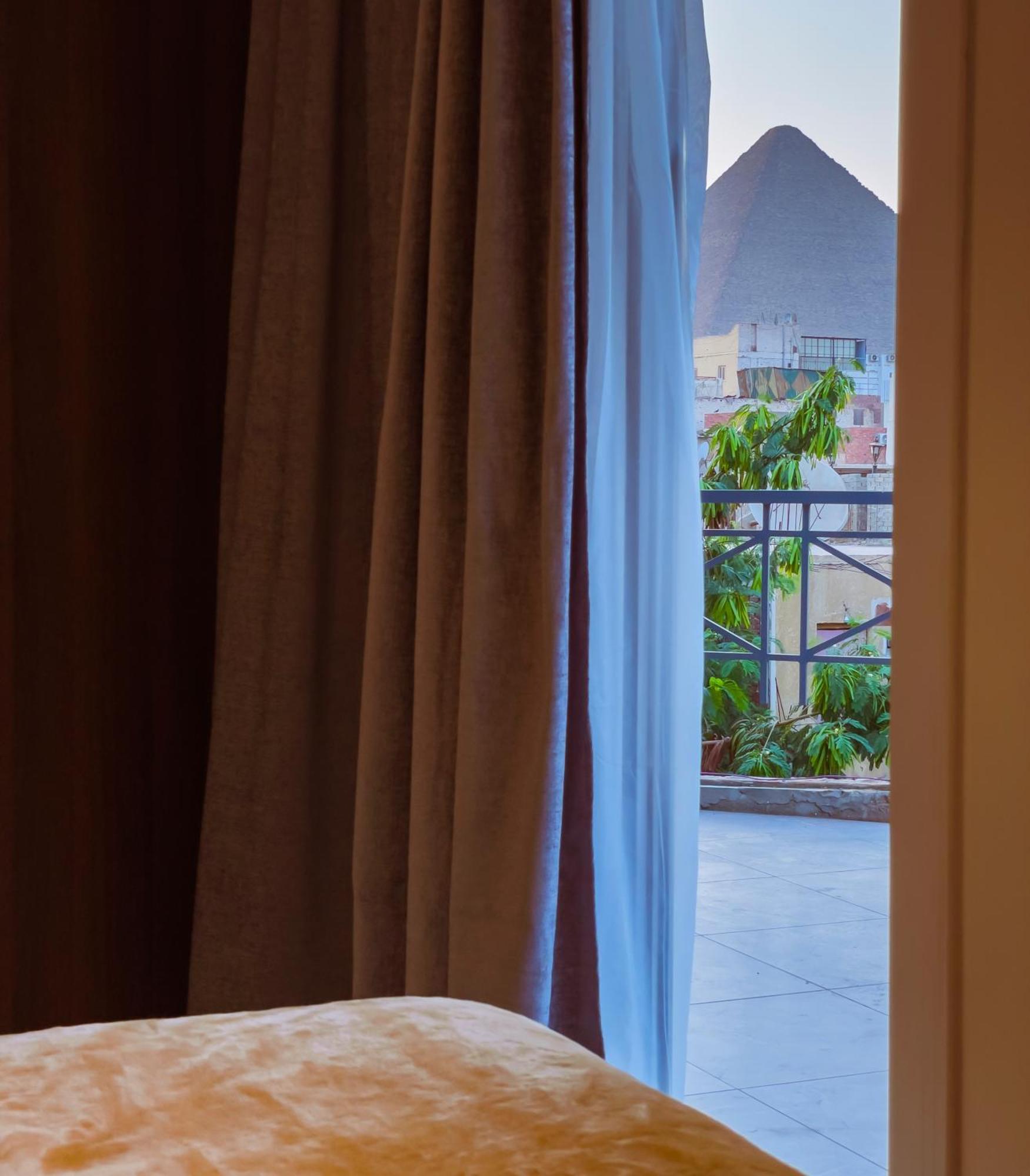 King Khufu Pyramids View Hotel Kafret el-Gabal Zimmer foto