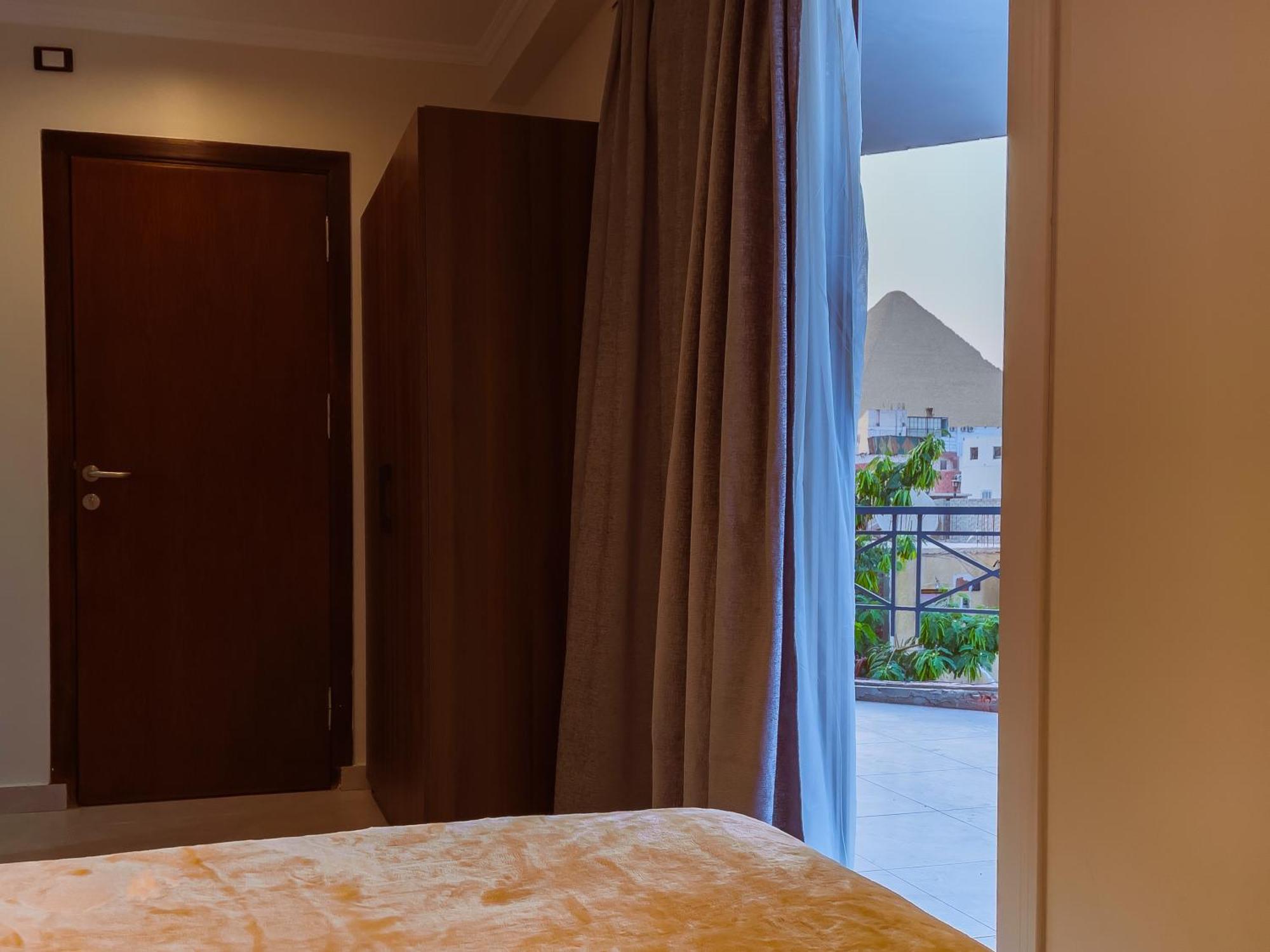 King Khufu Pyramids View Hotel Kafret el-Gabal Zimmer foto