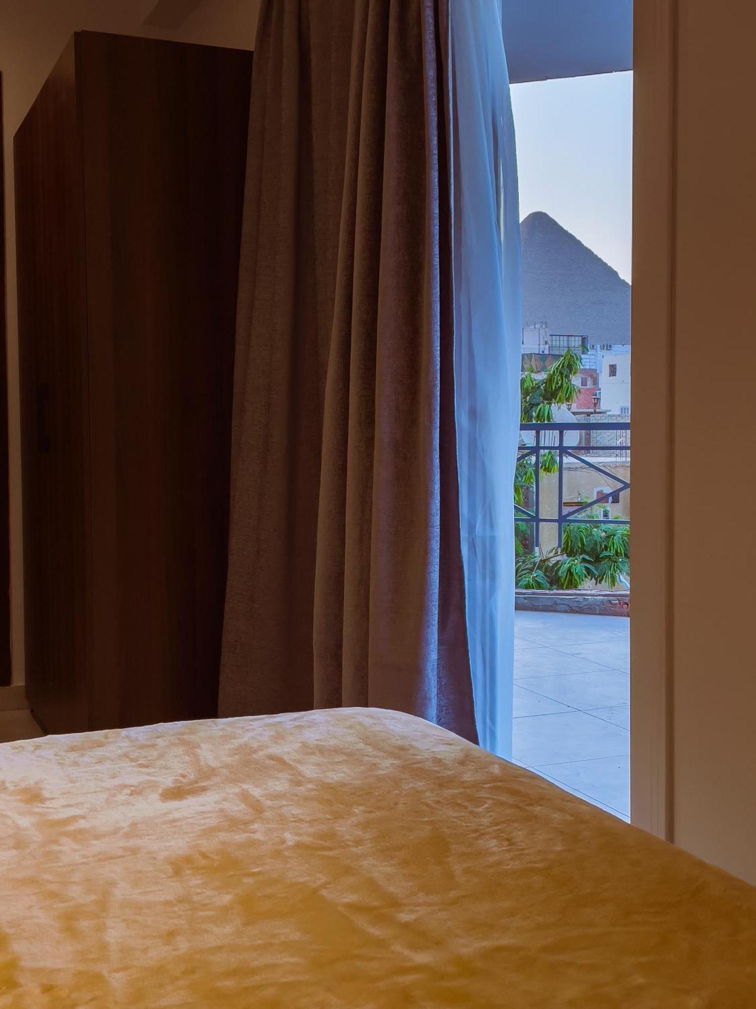 King Khufu Pyramids View Hotel Kafret el-Gabal Zimmer foto